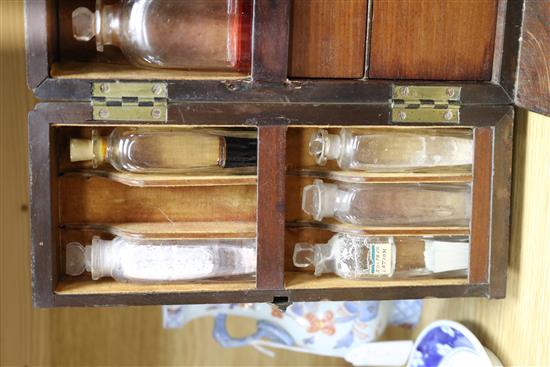 A 19th century mahogany apothecary cabinet